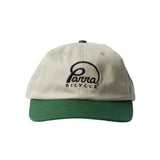 Beige and green cap with 'Parra Bicycle' logo on a white background