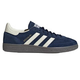 Navy blue Adidas sneaker with white stripes on a light gray background