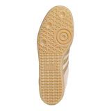 Close-up of a shoe sole with a textured pattern on a white background