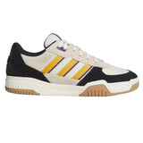 Sneaker with black, white, yellow, and brown design on a white background