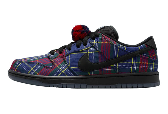 Plaid-patterned sneaker with a black Nike logo on a gray background
